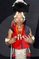 Naga tribal man in traditional outfit, Kisima Nagaland Hornbill festival, Kohima, Nagaland, India