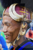Naga tribal man in traditional outfit, Kisima Nagaland Hornbill festival, Kohima, Nagaland, India