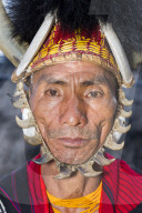 Naga tribal man in traditional outfit, Kisima Nagaland Hornbill festival, Kohima, Nagaland, India