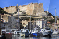Old citadel view with yachts in the marina, Bonifacio, Corsica, France
