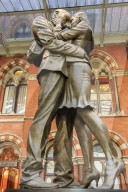 Paul Day's Meeting Place statue, known as the Lovers, St. Pancras, historic Victorian gothic railway station, London, England, United Kingdom, Europe