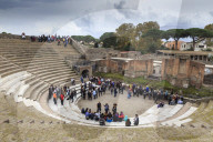 Tour groups in the Large (Grand) Theatre, Roman ruins of Pompeii, UNESCO World Heritage Site, Campania, Italy, Europe