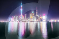Foggy yet colorful skyline Shanghai Pudong at night.