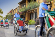 Cyclos and drivers in Hoi An, Vietnam, Indochina, Southeast Asia, Asia