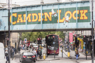 Double decker bus on the shopping streets of Camden Lock Market, North West Londo, London, England, United Kingdom, Europe