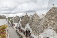 The typical huts called Trulli built with dry stone with a conical roof Alberobello province of Bari Apulia Italy Europe