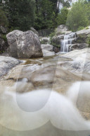 View of the Purcaraccia waterfalls and natural pools in summer Punta di Malanda Bavella Mountains Quenza Corsica France Europe