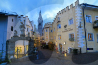 The Goldener Adler Hotel and the bell tower of Cathedral of Brixen (Bressanone), province of Bolzano, South Tyrol, Italy, Europe