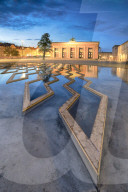Thorvaldsens Museum reflected in the fountain of Bertel Thorvaldsen's Square at night, Copenhagen, Denmark