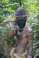 Traditional dressed man holding a spear, Ekasup cultural village, Efate, Vanuatu