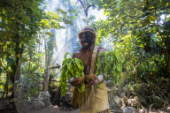 Traditional dressed man in the jungle,, Ekasup cultural village, Efate, Vanuatu