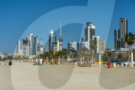 Shuwaikh beach before the skyline of Kuwait City, Kuwait