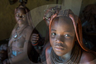 Friendly Himba women in their hut, Kaokoland, Namibia