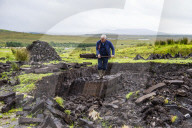 Blocks of peat cut out on a traditional farm, Connemara National Park, Republic of Ireland
