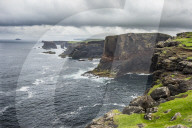 The dramatic cliffs under the Eshaness Lighthouse; Shetland islands, United Kingdom