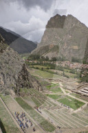 Tourists visit the ruins of the Inca archaeological site of Ollantaytambo near Cusco. Peru
