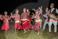 Nepali girls dancing to the tunes of Nepali folk songs. They are wearing chaubandi cholo (blouse) and fariya (skirt).