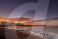 Brighton Pier and beach at sunrise, Brighton, East Sussex, Sussex, England, UK, Europe