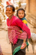 Woman carrying her child in Bhaktapur