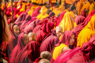 Buddhist Monks praying around temple at Bouddha