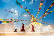 Buddhist Monks walking around temple at Bouddha