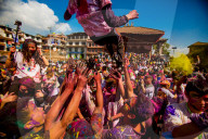 Crowd throwing pigment at the Holi Festival, Durbar Square