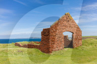 Red brick buildings, ruins of the industrial quarrying activity near to Porthgain harbour, Pembrokeshire.