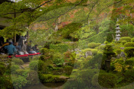 Tourists enjoying early autumn colours in Sanzen-in temple, Kyoto