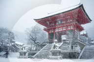 Entrance gate of Kiyomizudera temple during snow storm, Kyoto, Japan
