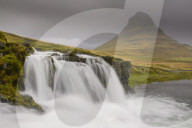 Kirkjufellsfoss on a cloudy day on the Snaefellsness Peninsula, Iceland.