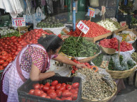 Woman selling produce at a traditional market, Oaxaca, Mexico, North America