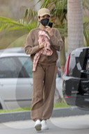 Nikki Reed is seen dropping her dog off at the vet.