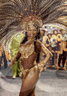 Brazil, State of Rio de Janeiro, City of Rio de Janeiro, Samba Dancer in the Carnival Parade.