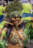 Brazil, State of Rio de Janeiro, City of Rio de Janeiro, Samba Dancer in the Carnival Parade.