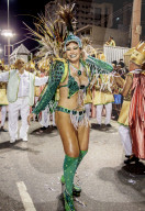 Brazil, State of Rio de Janeiro, City of Rio de Janeiro, Samba Dancer in the Carnival Parade.