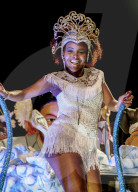 Brazil, State of Rio de Janeiro, City of Rio de Janeiro, Samba Dancer in the Carnival Parade.