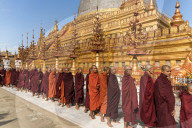 Monks at the Shwezigon Pagoda, Bagan (Pagan), Myanmar (Burma), Asia