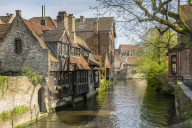 Typical houses on water canal. Bruges, West Flanders province, Flemish region, Belgium.