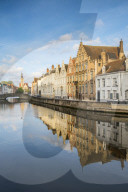 Houses reflection on Langerei canal. Bruges, West Flanders province, Flemish region, Belgium.