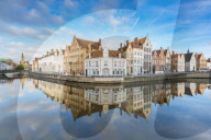 Houses reflection at Spiegelrei corner. Bruges, West Flanders province, Flemish region, Belgium.