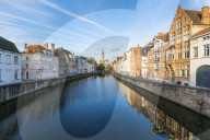Houses and belfry on water canal. Bruges, West Flanders province, Flemish region, Belgium.