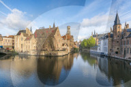 Houses and belfry reflection on Dijver canal. Bruges, West Flanders province, Flemish region, Belgium.