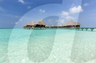 Clear sea, blue sky and over-water villas, Coco Palm, Dhuni Kolhu, Baa Atoll, Republic of Maldives, Indian Ocean