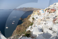 Classic view of the village of Oia with its blue domed churches and colourful houses, Oia, Santorini, Cyclades, Greece