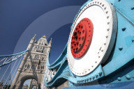 Wide angle view of Tower Bridge against blue sky, London, England