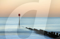 Groyne and post at sunset on Blyth Beach, Blyth, Northumberland, England
