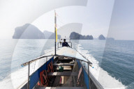 Traditional longtail boat with the Koh Hong Islands in the background, Krabi Coast, Krabi, Thailand