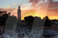 View towards the Koutoubia Minaret at sunset from the Djemaa el Fna, Marrakech, Morocco