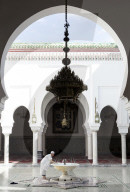 Local man washing in courtyard of Kairaouine Mosque (Mosque of al-Qarawiyyin), Fez, Morocco
