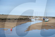 View of the harbour at low tide, morning, Wells-next-the-Sea, North Norfolk, England